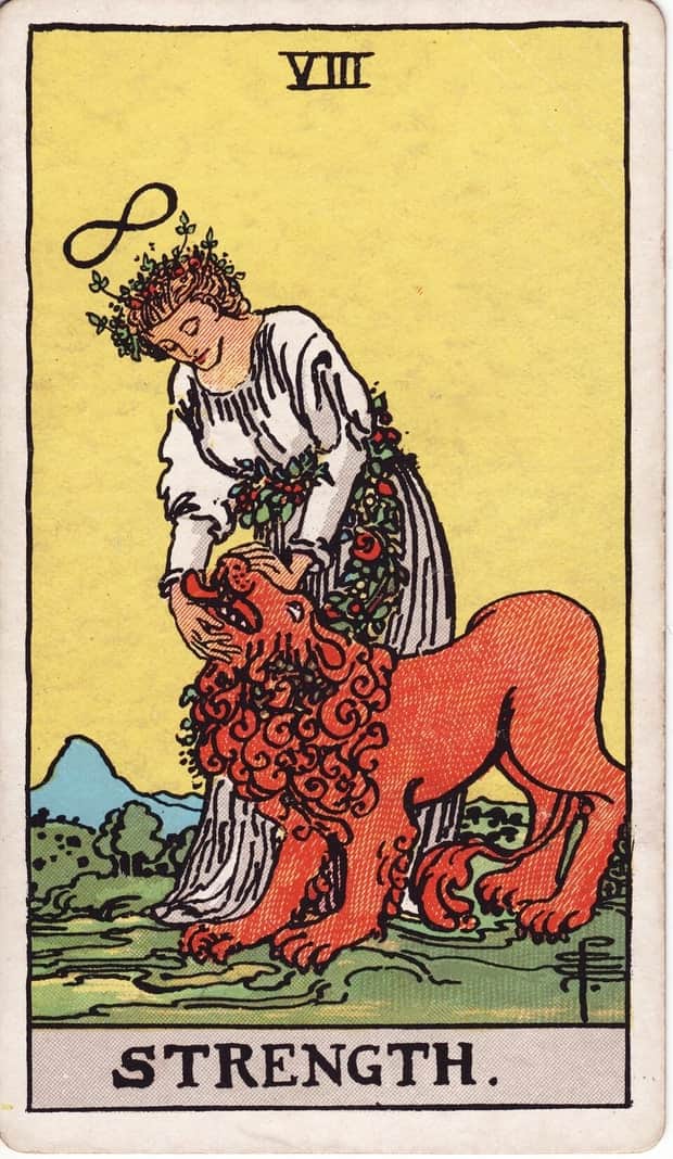 A gravura da carta A Força no baralho de tarot Rider-Waite-Smith